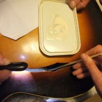 Applying glue to the loose braces&nbsp;&copy;&nbsp;2026&nbsp;Guitar Angel