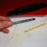 Washburn EA50 Bridge base and saddle lowered to attain a low action&nbsp;&copy;&nbsp;2026&nbsp;Guitar Angel