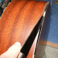 Martin, loose back&nbsp;&copy;&nbsp;2026&nbsp;Guitar Angel